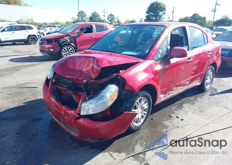 2013 Suzuki Sx4 Le/Le Popular z USA, uszkodzony, nr VIN JS2YC5A36D6100855